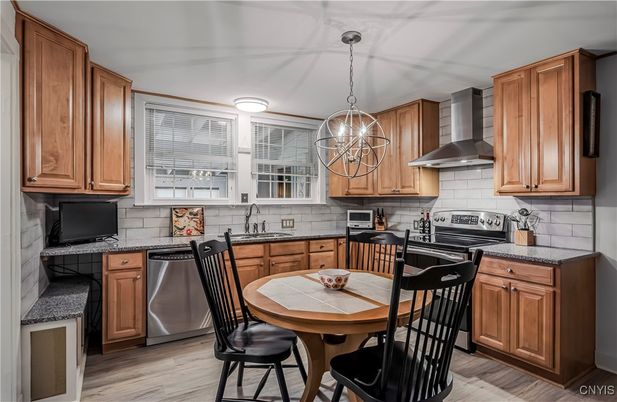 Dining room, Interior, Kitchen, Pendant Lights, Stainless Steel Appliances, Wood Texture Flooring