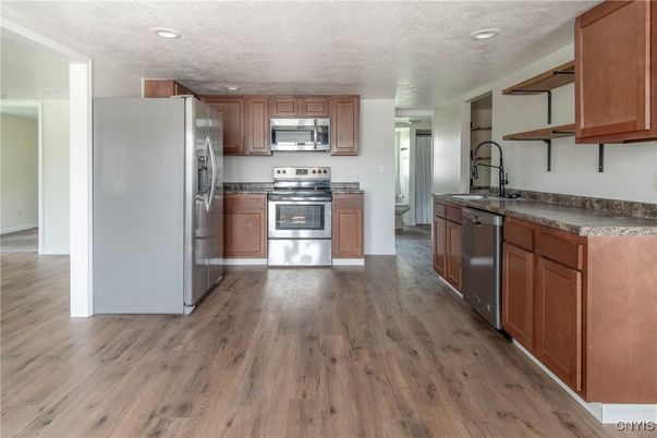 Interior, Kitchen, Recessed Lighting, Stainless Steel Appliances, Wood Texture Flooring