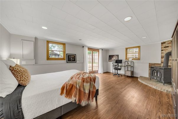 Bedroom, Fireplace, Interior, Recessed Lighting, Wood Texture Flooring