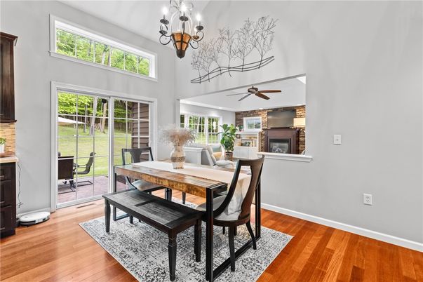 Chandelier, Dining room, Fireplace, Interior, Wood Texture Flooring