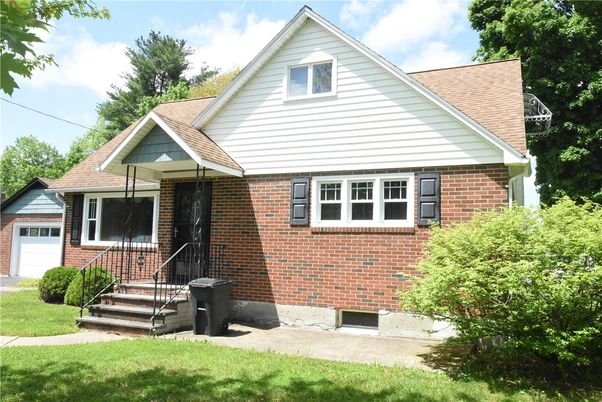 Exterior, Facade, Brick Facade, Cape Cod
