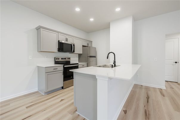 Interior, Kitchen, Recessed Lighting, Stainless Steel Appliances, Wood Texture Flooring