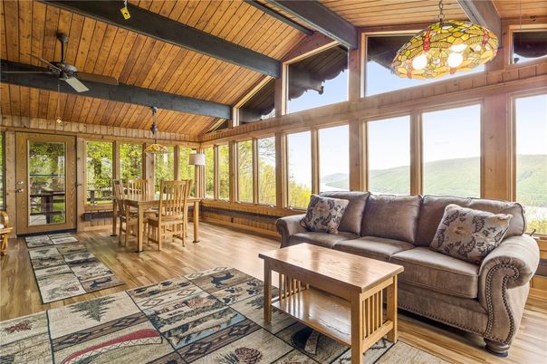 Chandelier, Dining room, Interior, Living room, Pendant Lights, Sun Room, Wooden Beams, Wooden Ceilings, Wood Texture Flooring