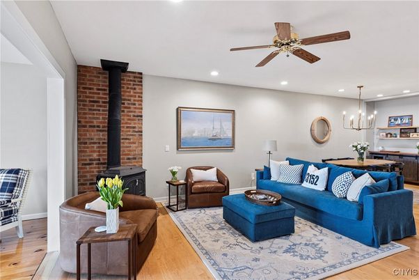 Dining room, Interior, Living room, Pendant Lights, Recessed Lighting, Stone Walls, Wood Texture Flooring