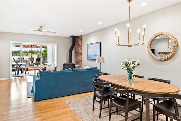 Dining room, Fireplace, Interior, Living room, Pendant Lights, Recessed Lighting, Stone Walls, Wood Texture Flooring