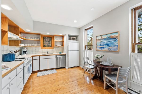 Dining room, Interior, Kitchen, Recessed Lighting, Stainless Steel Appliances, Wood Texture Flooring