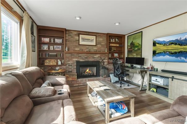 Fireplace, Home Office, Interior, Living room, Recessed Lighting, Stone Walls, Wood Texture Flooring