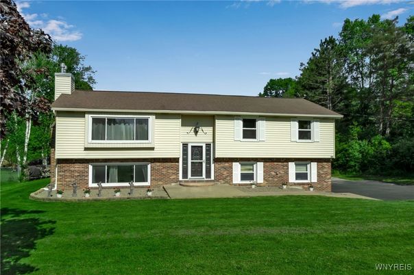 Exterior, Facade, Brick Facade, Raised Ranch