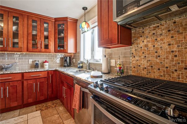 Interior, Kitchen, Pendant Lights, Stainless Steel Appliances, Stone Walls