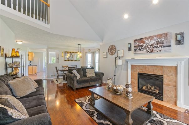 Dining room, Fireplace, Interior, Living room, Pendant Lights, Recessed Lighting, Wood Texture Flooring