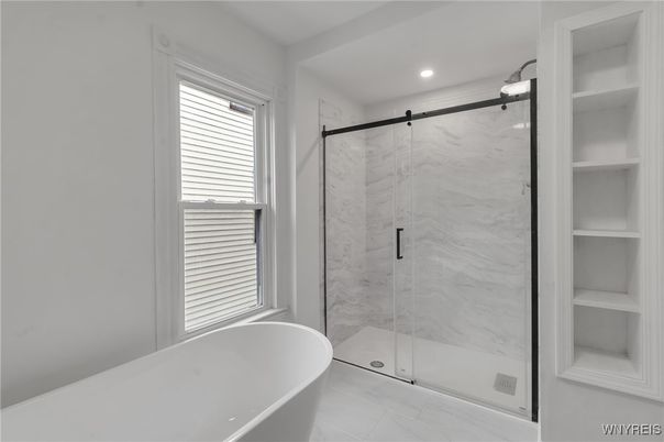 Bathroom, Free Standing Baths, Glass Shower, Interior, Marble Walls, Recessed Lighting