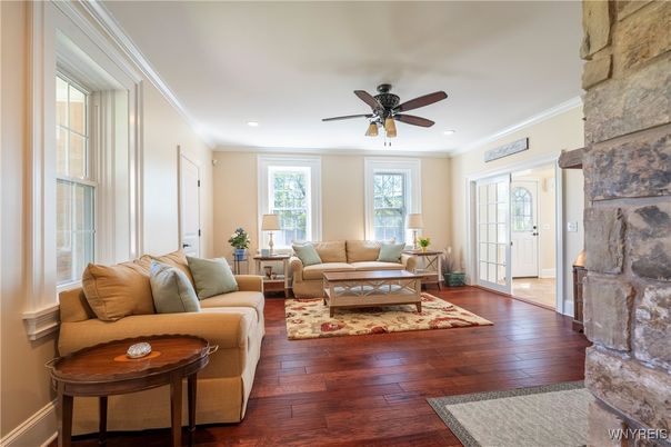Fireplace, Interior, Living room, Recessed Lighting, Stone Walls, Wood Texture Flooring