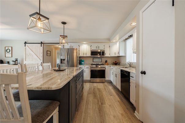 Interior, Kitchen, Pendant Lights, Recessed Lighting, Stainless Steel Appliances, Wood Texture Flooring