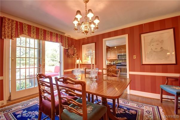 Chandelier, Dining room, Interior, Kitchen, Stainless Steel Appliances, Wood Texture Flooring