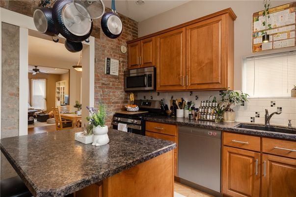 Dining room, Interior, Kitchen, Pendant Lights, Stainless Steel Appliances, Stone Walls