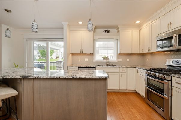 Interior, Kitchen, Pendant Lights, Recessed Lighting, Stainless Steel Appliances, Wood Texture Flooring