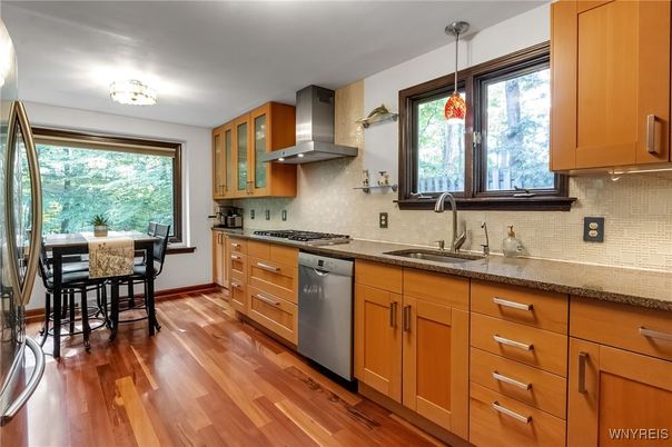 Dining room, Interior, Kitchen, Pendant Lights, Stainless Steel Appliances, Wood Texture Flooring