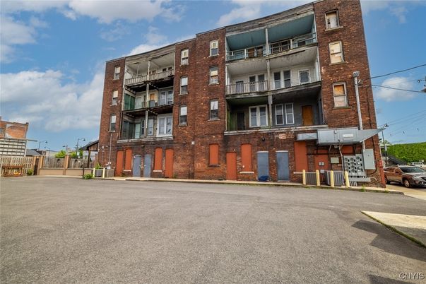 Exterior, Facade, Brick Facade, Condo Building