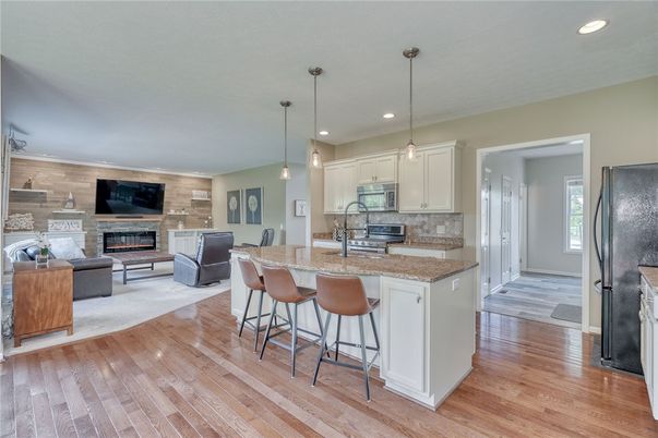 Fireplace, Interior, Kitchen, Living room, Pendant Lights, Recessed Lighting, Stone Walls, Wood Texture Flooring