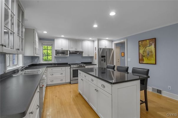 Interior, Kitchen, Recessed Lighting, Stainless Steel Appliances, Wood Texture Flooring