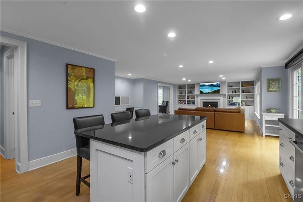 Dining room, Fireplace, Interior, Kitchen, Living room, Recessed Lighting, Wood Texture Flooring