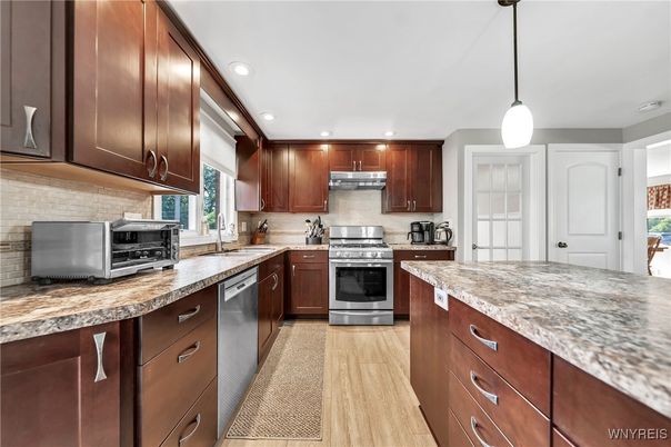 Interior, Kitchen, Pendant Lights, Recessed Lighting, Stainless Steel Appliances, Wood Texture Flooring