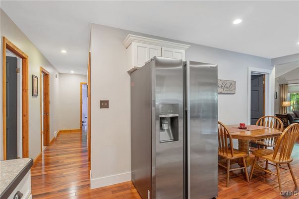 Dining room, Interior, Kitchen, Recessed Lighting, Stainless Steel Appliances, Wood Texture Flooring