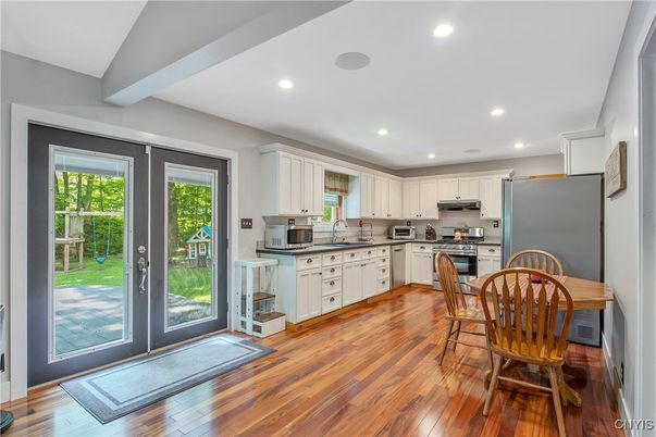 Interior, Kitchen, Recessed Lighting, Stainless Steel Appliances, Wood Texture Flooring