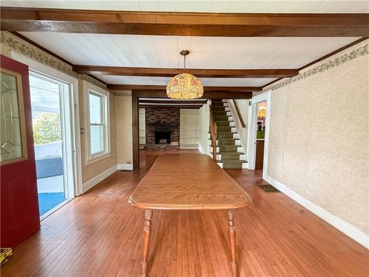 Dining room, Fireplace, Interior, Pendant Lights, Wooden Beams, Wood Texture Flooring