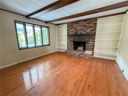 Empty room, Fireplace, Interior, Stone Walls, Wooden Beams, Wood Texture Flooring