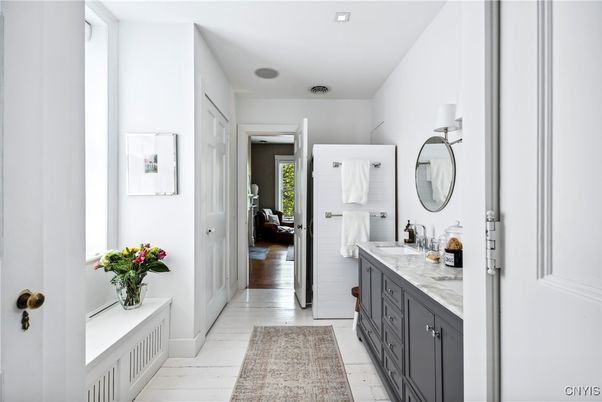 Bathroom, Dual Sink Vanities, Interior, Marble, Recessed Lighting, Wood Texture Flooring