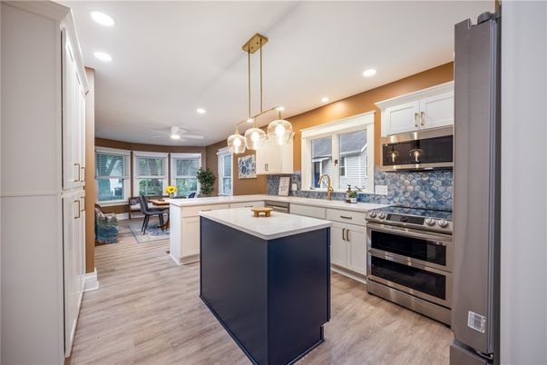 Interior, Kitchen, Pendant Lights, Recessed Lighting, Stainless Steel Appliances, Wood Texture Flooring