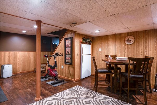 Dining room, Fitness Equipment, Interior, Recessed Lighting, Wood Texture Flooring, Wooden Walls