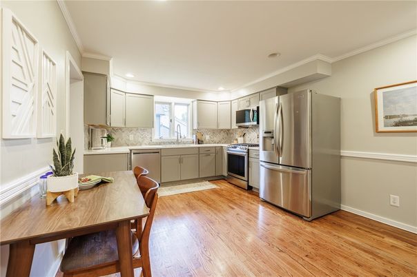 Dining room, Interior, Kitchen, Recessed Lighting, Stainless Steel Appliances, Wood Texture Flooring