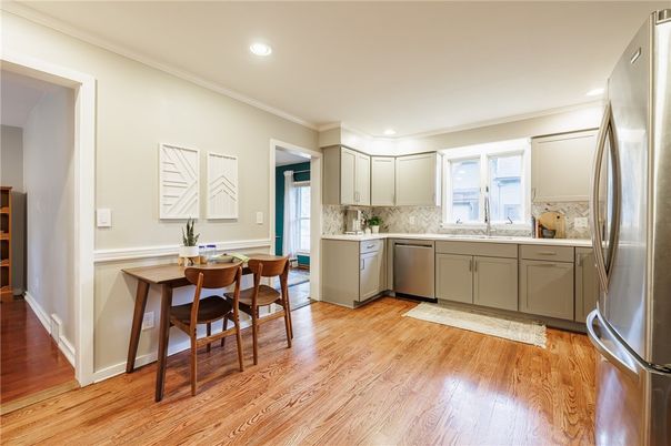Dining room, Interior, Kitchen, Recessed Lighting, Stainless Steel Appliances, Wood Texture Flooring