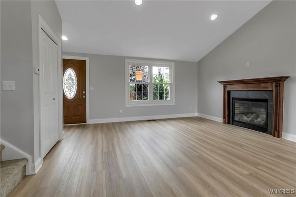 Empty room, Fireplace, Interior, Recessed Lighting, Wood Texture Flooring