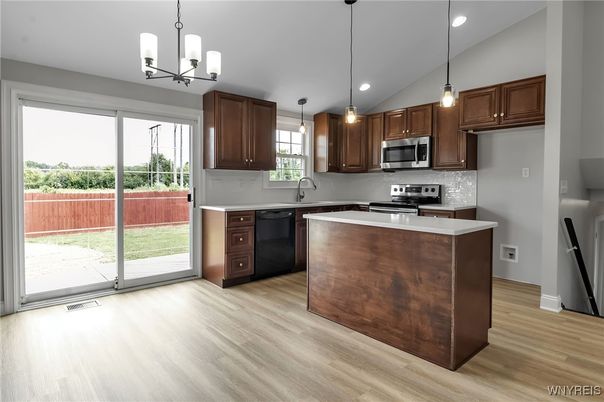 Chandelier, Interior, Kitchen, Pendant Lights, Recessed Lighting, Stainless Steel Appliances, Wood Texture Flooring