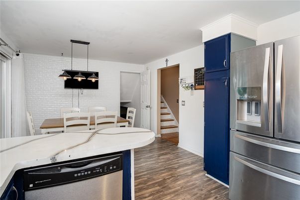Dining room, Interior, Kitchen, Pendant Lights, Stainless Steel Appliances, Wood Texture Flooring