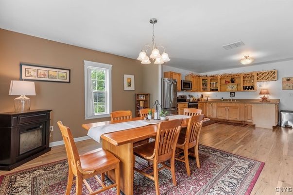 Dining room, Interior, Kitchen, Pendant Lights, Stainless Steel Appliances, Wood Texture Flooring