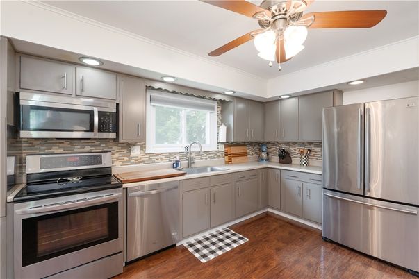 Interior, Kitchen, Recessed Lighting, Stainless Steel Appliances, Wood Texture Flooring
