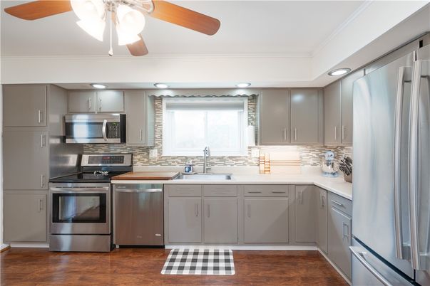 Interior, Kitchen, Recessed Lighting, Stainless Steel Appliances, Wood Texture Flooring