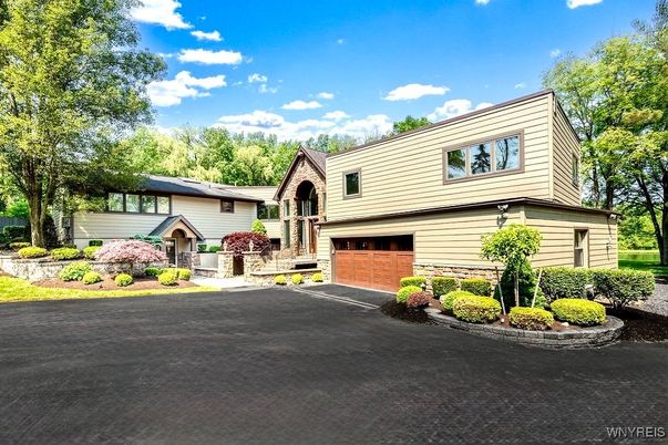 Attached, Exterior, Facade, Raised Ranch