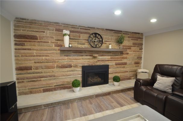 Fireplace, Interior, Recessed Lighting, Stone Walls, Wood Texture Flooring, Wooden Walls