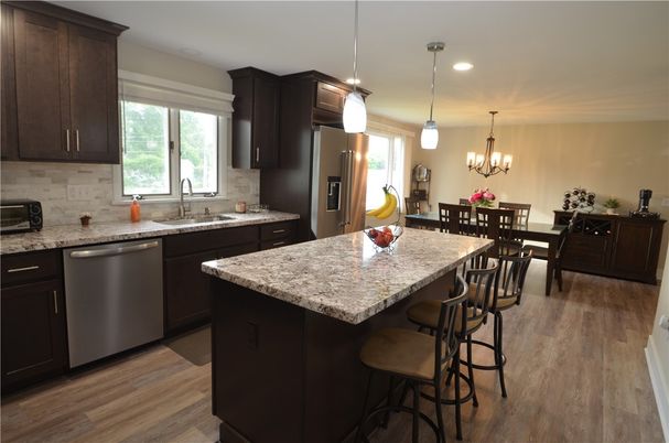 Chandelier, Dining room, Interior, Kitchen, Pendant Lights, Recessed Lighting, Stainless Steel Appliances, Wood Texture Flooring