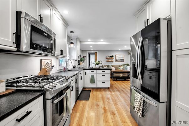 Interior, Kitchen, Pendant Lights, Recessed Lighting, Stainless Steel Appliances, Wood Texture Flooring