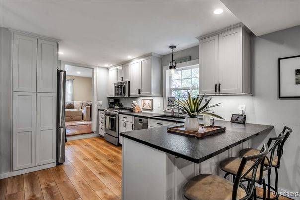 Interior, Kitchen, Pendant Lights, Recessed Lighting, Stainless Steel Appliances, Wood Texture Flooring