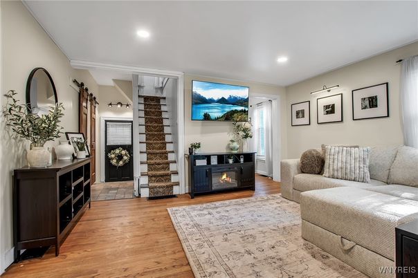 Fireplace, Interior, Living room, Recessed Lighting, Wood Texture Flooring
