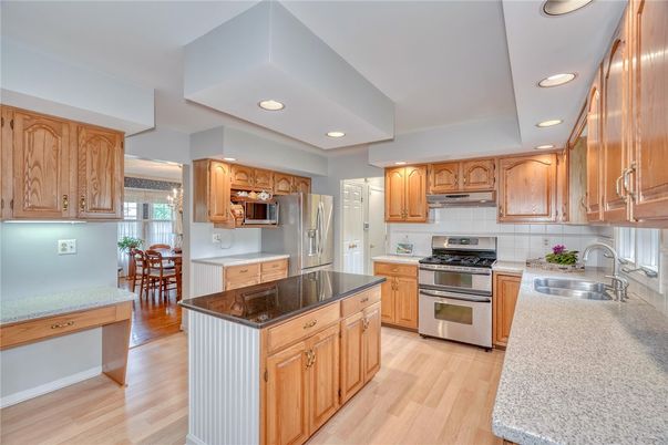 Dining room, Interior, Kitchen, Recessed Lighting, Stainless Steel Appliances, Wood Texture Flooring
