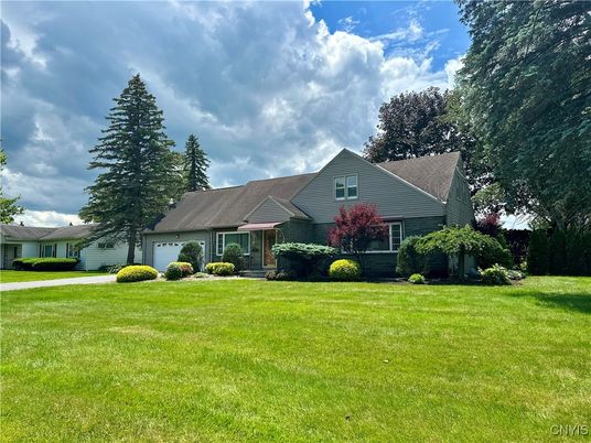 Attached, Backyard, Exterior, Facade, Brick Facade, Ranch