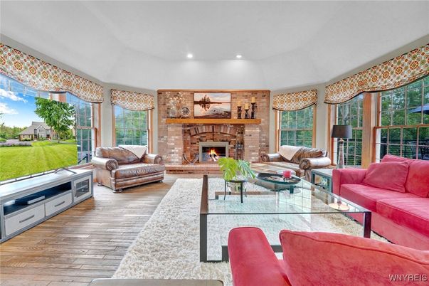 Fireplace, Interior, Living room, Recessed Lighting, Stone Walls, Wood Texture Flooring